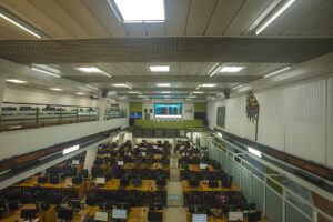 Trading desks and market display in a Nigerian stock-exchange hall